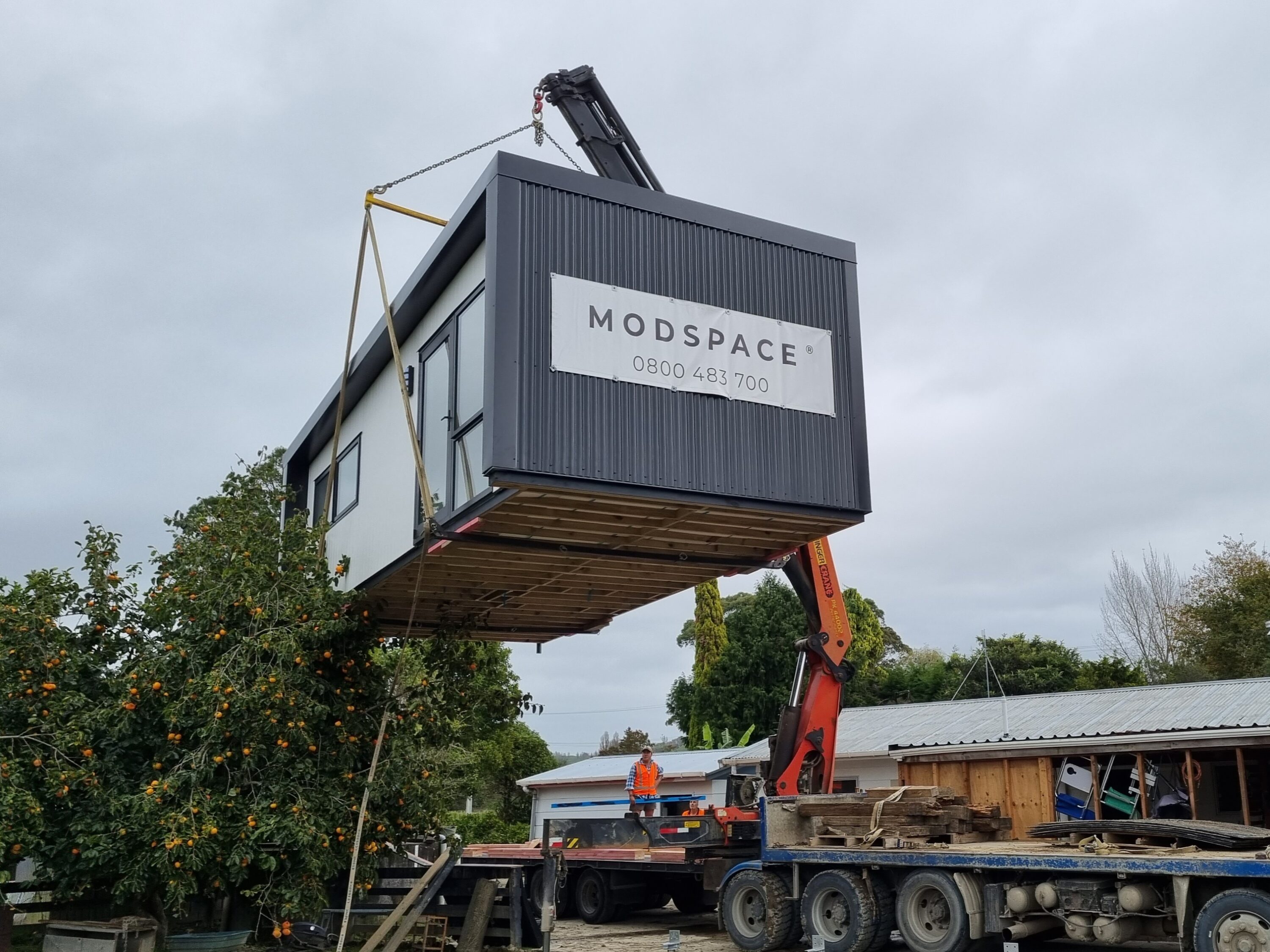 Home lifted by crane